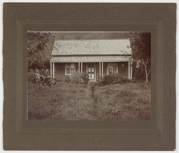 Weather board house with an iron roof and veranda. 